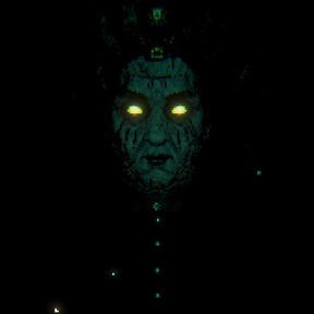 a still image of Grimora from act three of Inscryption. She is a humanoid figure with green skin and yellow eyes. Her eyes have no pupils nor iris. She has three marks on both of her cheeks. She has black lips and is wearing a black dress with several buttons on the chest. it is hard to make out a few details due to the picture and background being dark. She is staring at the viewer with a bit of an angry expression.