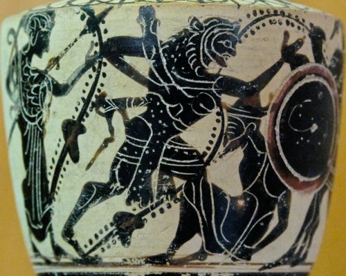 Heracles battles the three-bodied monster Geryon (right), having already defeated his servant Euryti