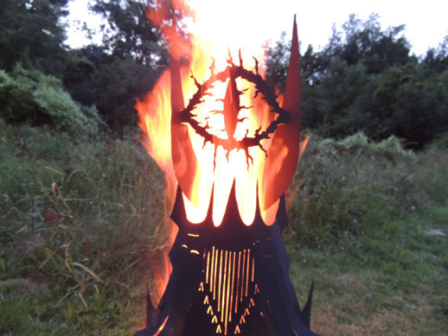 nerdsandgamersftw:    Barad-dûr Fire Pit Handmade item  Approximately 5 foot high and 2 foot wide base made from heavy gauge steel Materials: metal, steel, fire, firepit Created by Trevor McIntyre of Image Metal art | Available via Etsy 