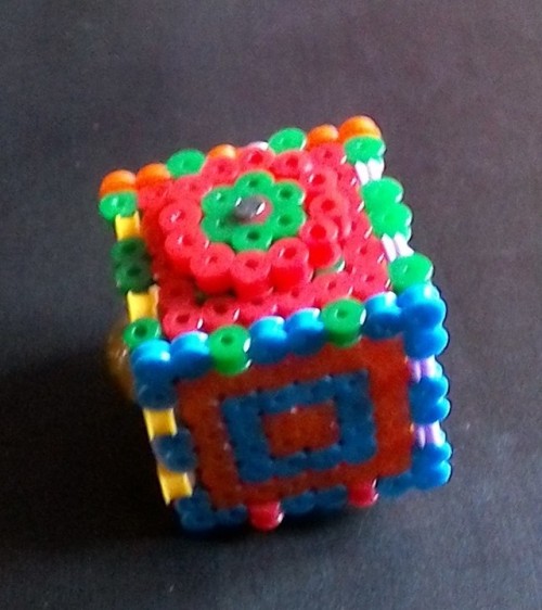 Fidget cube made from perler beads, with this tutorial [ x ]