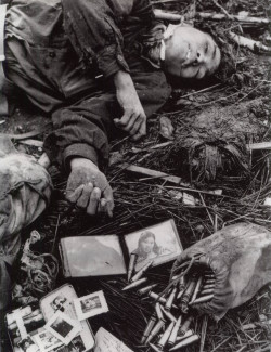 historicporn:  North Vietnamese solider lays