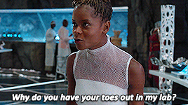toney-starks:I invite you to my lab and you just kick things around?Letitia Wright as Shuri in Black