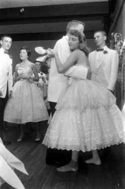 theniftyfifties:  A young couple slow dancing,