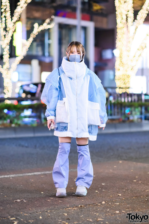 Japanese graphic designer Nene on the street in Harajuku wearing an oversized jacket by Japanese fas