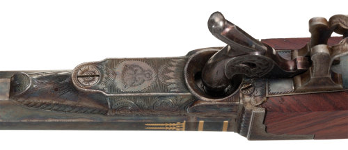 Cased set of French engraved gold inlaid underhammer percussion dueling pistols by Gosset, early to 