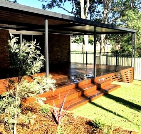 Deck PergolasDeck - Mid-sized Traditional Backyard Deck Idea With A Pergola