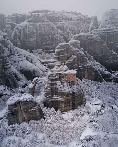 Snow veil in Meteora, Greece by Nancy Spathi. 