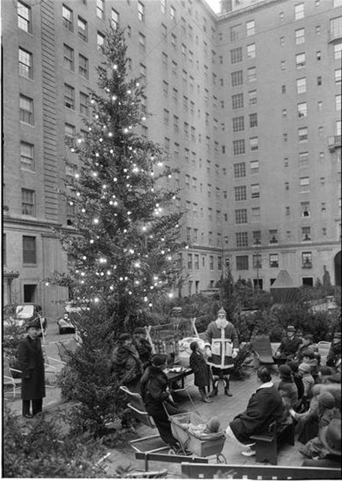 A Christmas tree being set up on the median opposite 277 Park Avenue (between 47th and 48th Streets)
