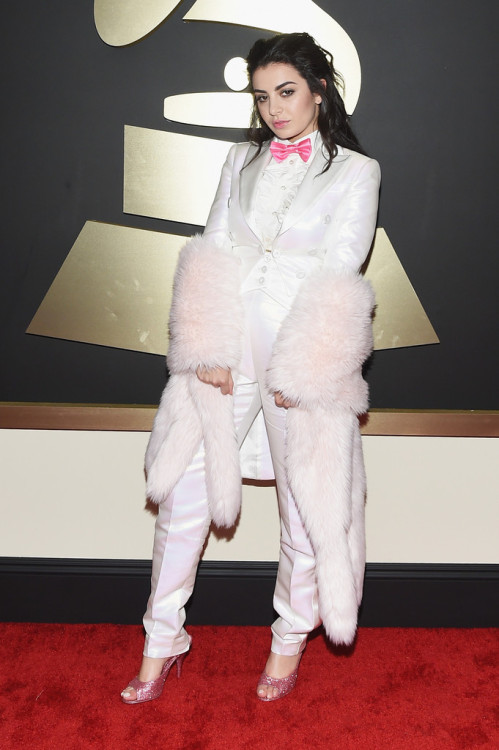 reverseracist:  twinkvogue:  :February 8: [More] Charli attends The 57th Annual GRAMMY Awards at the LA STAPLES Center  gawd  WHAT IS SHE WEARING????