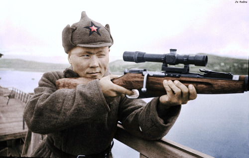 redarmyscreaming:Red Army border guard takes aim with a Mosin 91/30 PE sniper.