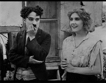 chaplinfortheages:He realizes that she is in love with someone else and he is crushed.This film clip