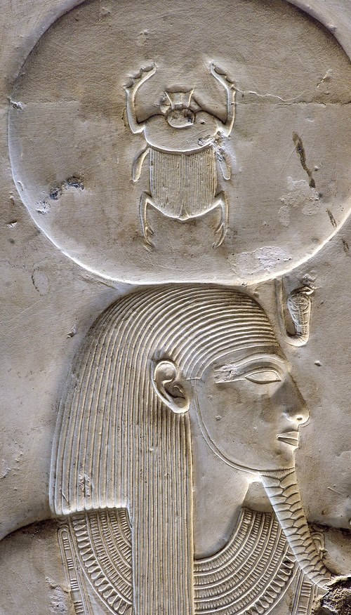 amntenofre: the God Ra-Harakhty, human-headed, wearing the Solar disk with the Uraeus.