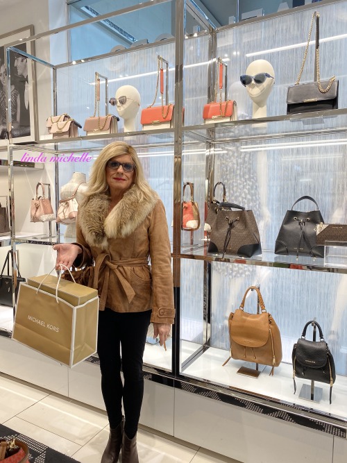 lindamichelletg:Shopping at Micheal Kors.  They have too many nice things!!