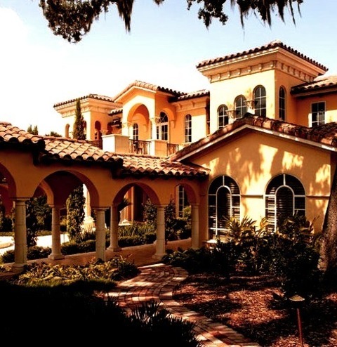 Mediterranean Exterior In OrlandoHuge Tuscan Beige Three-story Stucco Exterior Home Photo