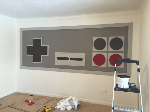 archiemcphee:  This giant Nintendo Entertainment System and controller are a fully functional and geektastically clever home entertainment system created by Imgur user tylerfulltilt. He modified a 3-drawer cabined from Overstock to look exactly like the