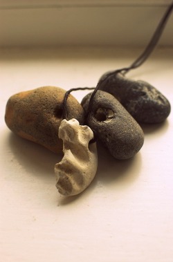 Hag stones. Traditional amulets. Stones with natural holes right