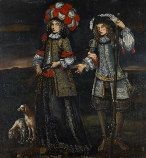  Portrait of a young woman and a young man in rich hunting dress with guns, standing in a lands