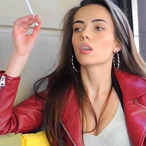 katemossfan: She is stunning, and smoking hot! Each time she ignites a cigarette, she knows that the