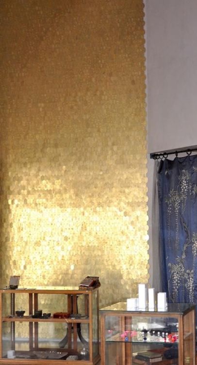 cabbagerose: impact: tumbled brass discs nailed to the wall via: lorrainepennington