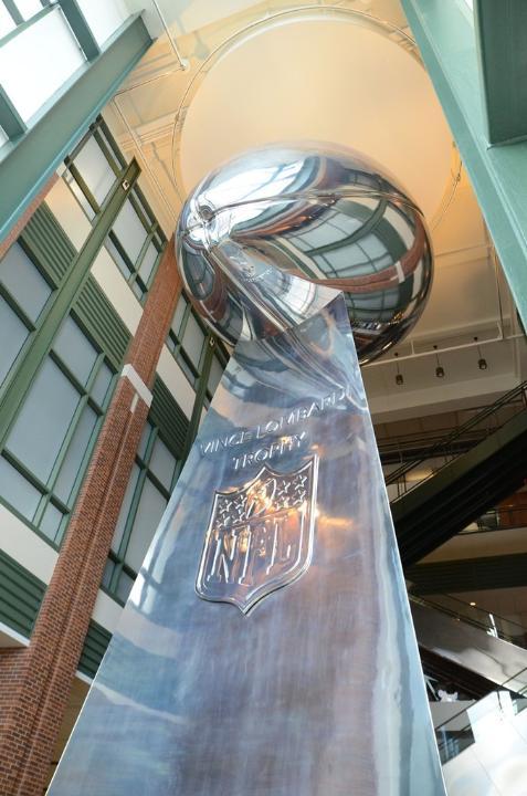 fyeahgreenbaypackers:  Packers unveil 50ft Lombardi Trophy at Lambeau Field.  Only the Green Bay Packers could display a 50-foot replica of the NFL's most revered trophy and not be guilty of hubris. You can do that sort of thing when the trophy is named