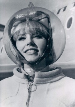 cbsheridan:  50 Years Ago This Week:  THE NEW LOOK IN AIR TRAVEL Excerpt from The Journal News, Week of November 22-28, 1965 The new look for Braniff Airways Stewardesses is this dazzling outfit including a plexiglass bubble to protect from wind and