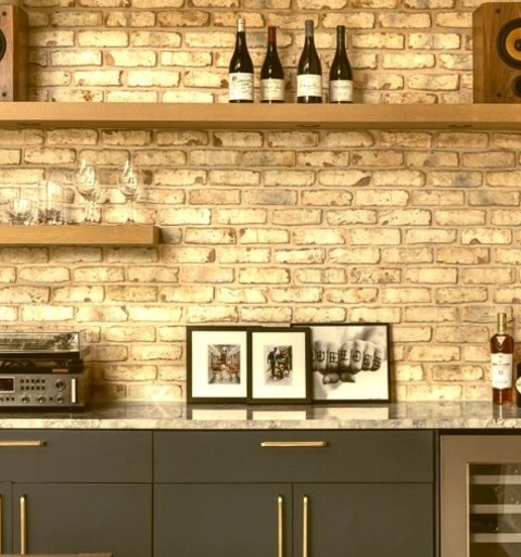 Austin Midcentury Home BarExample Of A Small 1950s Single-wall Light Wood Floor Dry Bar Design With Flat-panel