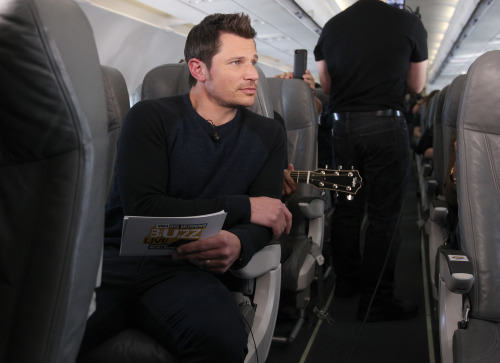 Host Nick Lachey is seen on the VH1’s “Big Morning Buzz Live” JetBlue flight to SX