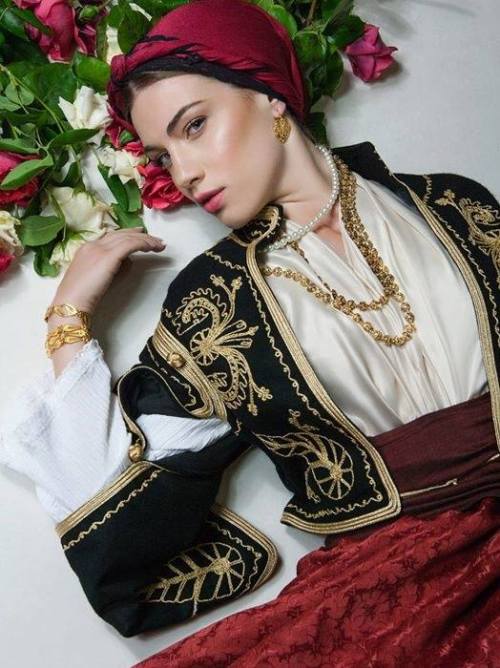 Greek beauty Athina from the island of Crete in Cretan traditional clothing and adornments