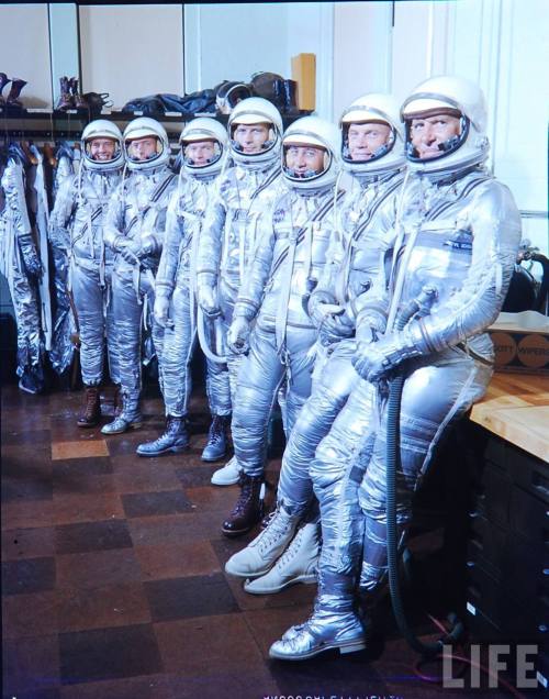 Mercury astronauts model their space suits (with an interesting array of boots)(Ralph Morse. 1959?)