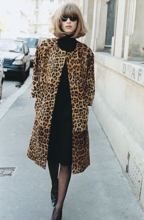 Left: Jackie Kennedy wearing a leopard print coat, turtleneck, and Roger Vivier shoes. Right: Modern