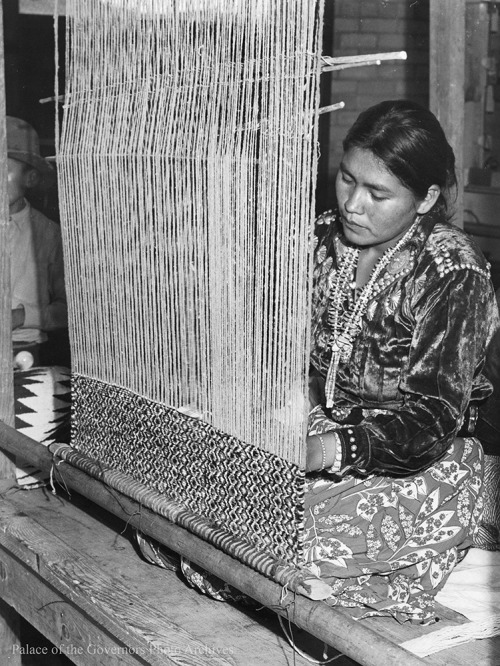 Navajo weaver, Gallup Ceremonial, Gallup, New MexicoPhotographer: Robert H. MartinDate: 1948Negative