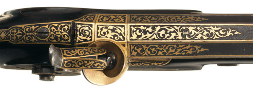 Magnificent cased, gold inlaid, and engraved pair of percussion dueling pistols by Prelat of Paris, 