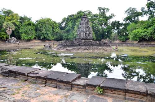 Neak Pean - The Temple of the “Entwined Serpents” - Angkor, Cambodia Set within a rectan