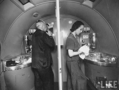 Split view of the men’s and ladies’s lavatories on United Airlines Mainliner(1940)