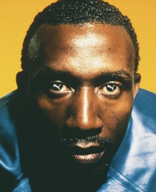 cosmicanger:Track runner Linford Christie wearing Puma contact lenses during the 1996 Olympics in Atlanta 🌺(a Reebok sponsored event btw 🤣)