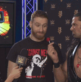 baleesi:  Sitting at the airport I was watching some classics… and oh look! A wild Sami Zayn appears! @ilovesamizaynn‘s man