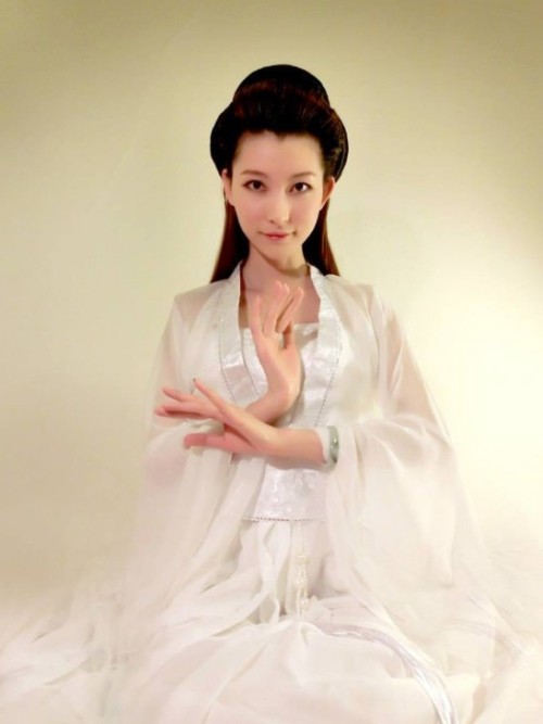 chinkqueen-li:  I get horny everytime wearing traditional chink dress, who wants to get off my clothes and help me out?