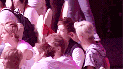  sehun playing with chanyeol’s ear  