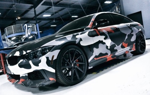 Porn BMW wrapped by West Coast Customs photos