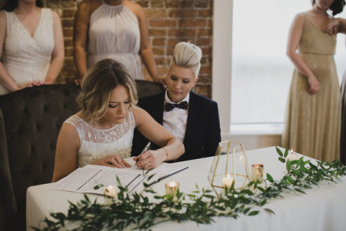 beautiful-brides-weddings:  She Met Her Bride at Pride Natasha was a single mom who “was slowly coming out to friends and family” when she attended Pride in her hometown three years ago. “I was out celebrating with my best friend, and she spotted