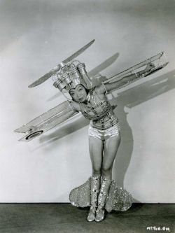 A chorus girl wearing a very unique dance