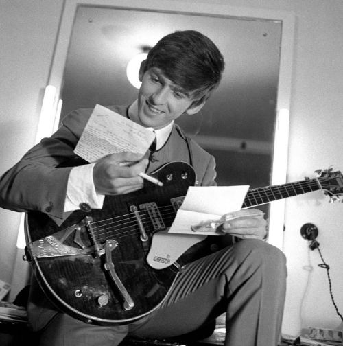 theswinginsixties - The Beatles - George Harrison reading some...