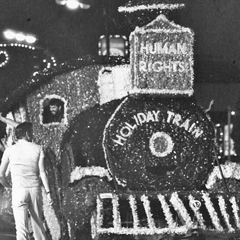 The Human Rights Holiday Train (with Reverend Troy Perry in the window), the first float sponsored b