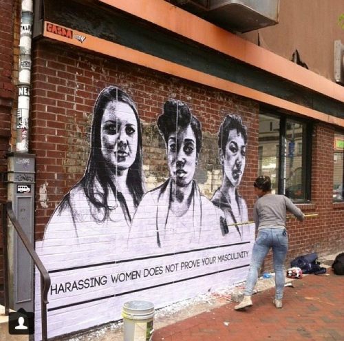 stoptellingwomentosmile:  “Harassing Women Does Not Prove Your Masculinity”Pasting the first piece in Baltimore today, 4-25-14. I met these women 4 days ago at the group discussion - now they’re up on a wall. Will be doing a lot more pasting tomorrow! -TF