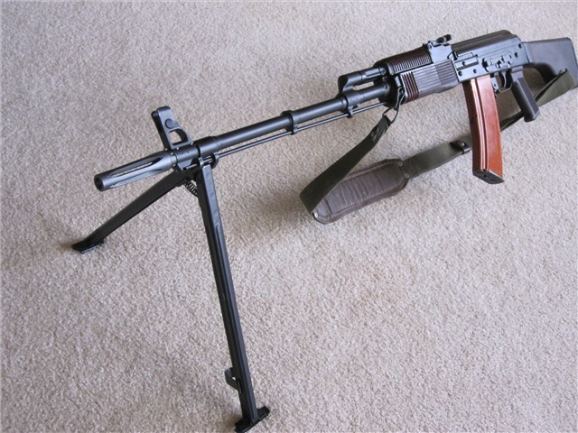 gunrunnerhell:  RPK-74 The fixed stock version chambered in 5.45x39mm. Not sure on