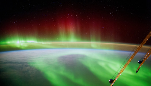 The ISS floating above the Aurora Borealis (desktop/laptop)Click the image to download the correct s