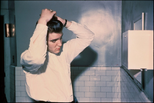 parishitme:Elvis Presley fixing his hair at the Mosque Theatre before two performances.