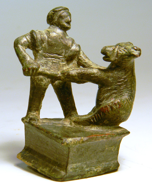 rodonnell-hixenbaugh:Roman Bronze Bear Trainer An ancient Roman bronze furniture attachment in the f