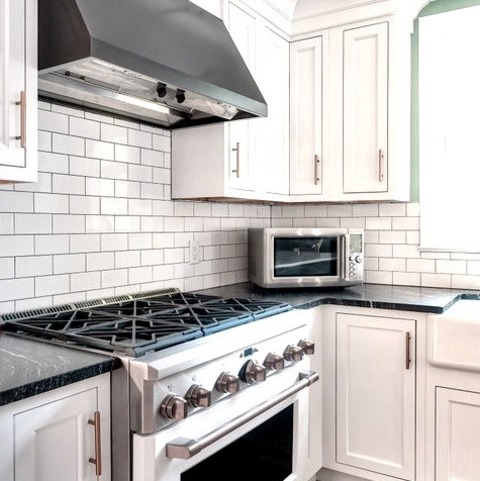 Kitchen NewarkExample Of A Large Transitional U-shaped Light Wood Floor And Brown Floor Enclosed Kitchen