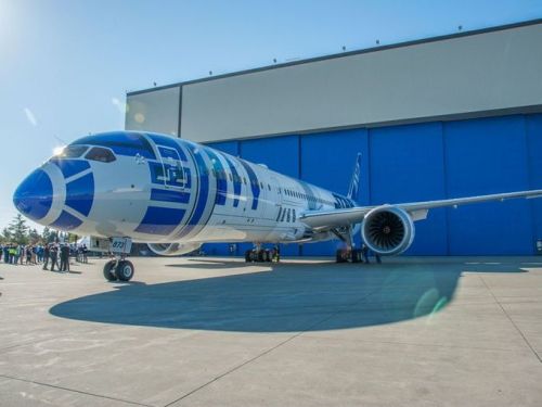 archatlas:  Boeing & ANA unveil R2-D2 Dreamliner Star Wars theme music played and Storm Troopers held guard as the hangar doors began to open. Within moments, a Boeing 787 “Dreamliner” painted with likeness of R2-D2 emerged to a cheering crowd